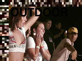 Wild party girls get wet and topless during a wet t-shirt contest