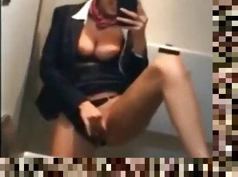 Naughty stewardess with hot tits masturbates in toilet