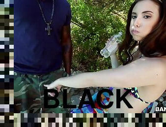 Casey Calvert sucks a black trouser snake in the yard and rides it