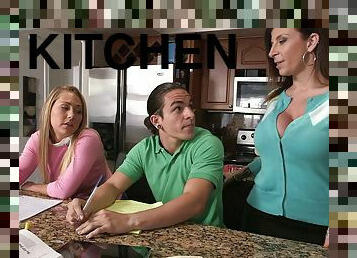 Sara Jay and her GF share their neighbour's cock in the kitchen