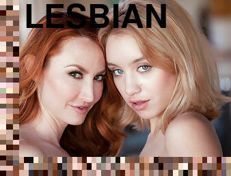 Ginger and blonde lesbians spend the day together in bed
