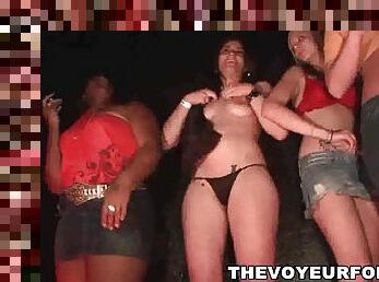Group of party girls flashing off their tits at the club