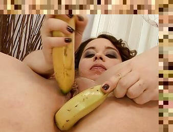 Olga Cabaeva toys herself with two bananas and gets fisted