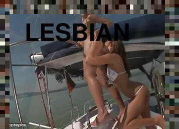 Two slim and sexy girls having hot FFM sex on a yacht