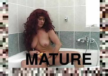 Mature redhead Tammy gets unforgettably fucked in the bathroom