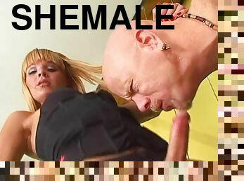 Lovely blonde shemale gives a blowjob and gets ass fucked
