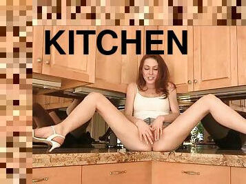 Stunning Ginger Hottie Playing With Herself In The Kitchen