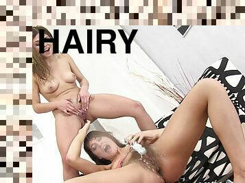 Hairy and shaved pussy babes pissing lustily on each other