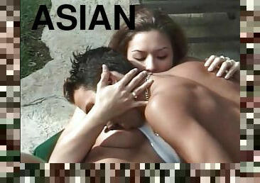 He licks sexy wet Asian pussy outdoors