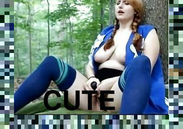 Cute Redhead having fun in the woods