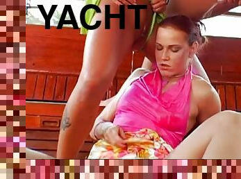 Two hypnotic ladies impaling their pussies on the relaxing yacht ride