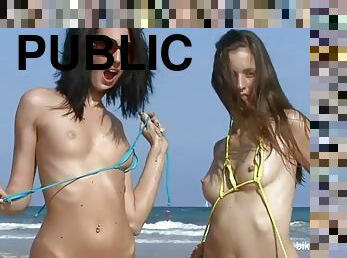 Two girls take off bikini