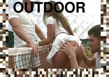 Sexy tennis babe threesome on the court with big cock guys