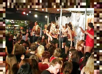 Women in slutty clothes hungry for men's hard cocks at a sex party