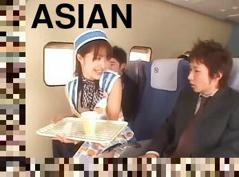 Very nice Asian flight attendant sucks a passenger's cock