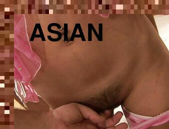 Leggy Asian girl with natural boobs sucks a white cock