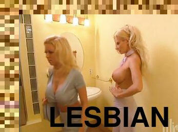 Hot Lesbian Action With Two Horny Blonde Babes In Restroom