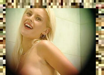 Peeping On Sandra Russo as She Masturbates With The Shower Sprayer