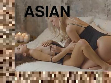 Stunning brunette teen Oksana Oksi poses with hot Asian lesbian Maki Katana