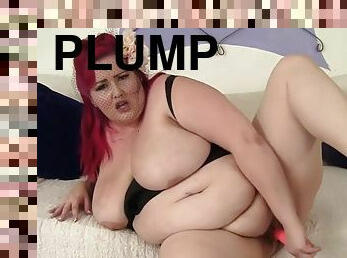 Redhead plumper sucks dildo and masturbates