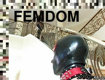 BDSM action along babe in leather blowing a cock and fucked in a femdom scene