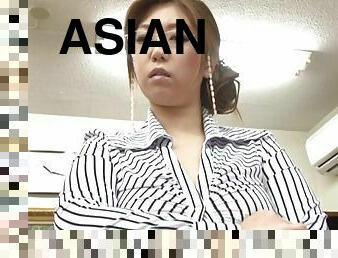 Naughty Asian office lady Naho Hazuki gives arousing footjob