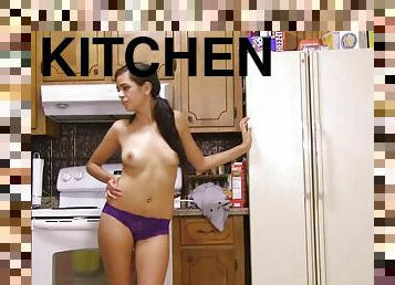 Naked girl in the kitchen