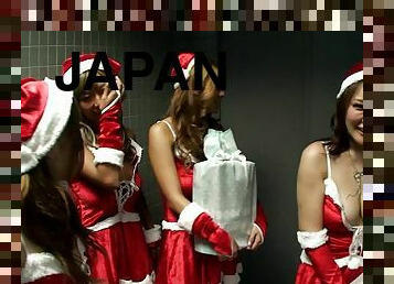 A few sexy Japanese Santa girls drive a man crazy with a handjob