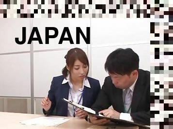 A Japanese office girl pulls her panties to the side and fucks in her office