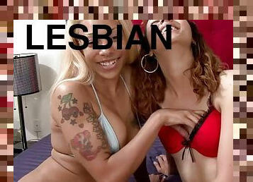 Sexy pornstars enjoy lesbian interracial strap on fucking