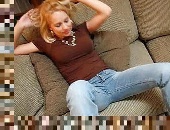 Jeans-clad blonde with a stunning body touching her hot ass