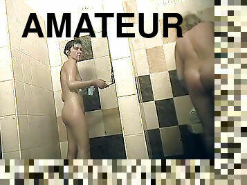 Amateur beauty is getting naked on the hidden camera