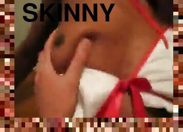 Skinny black girl in bikini boned