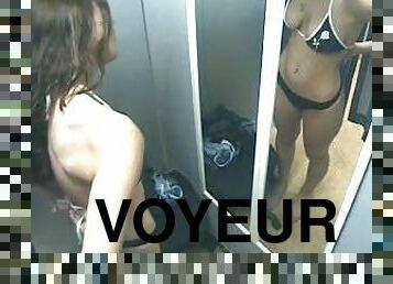 Chick trying on clothes in dressing room