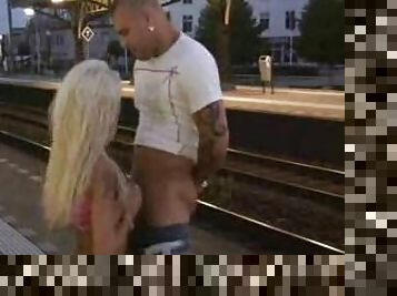 Girl sucking dick at a train station