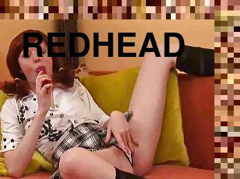 Teen redhead with toy in her cunt