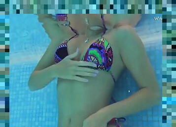Russian porn star Mary Kalisy swims naked in the pool