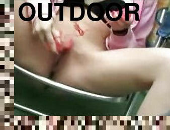 Girl masturbates outdoors on spy video