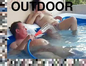 Outdoor Pussy Show. Naked Couple Playing in Outdoor Nudist Pool. Regina Noir Short 2