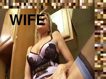 His housewife in lingerie sucks cock in kitchen