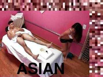 Asian in massage parlor sucks his cock