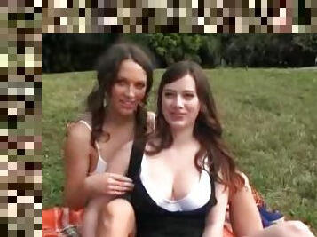 Girls with big tits suck nipples on a picnic