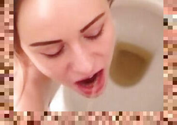 Hot girl drinking pee from cock in the toilet