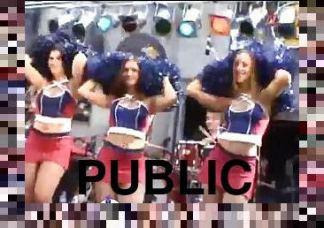 Cheerleaders in short skirts on stage at show