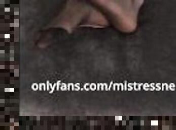 Dangling feet in dirty ripped pantyhose