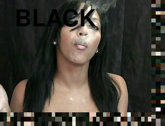Black babe likes smoking and teasing