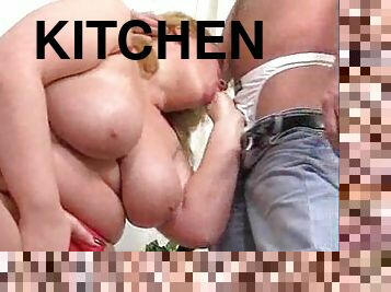 Chubby blonde in a kitchen fuck