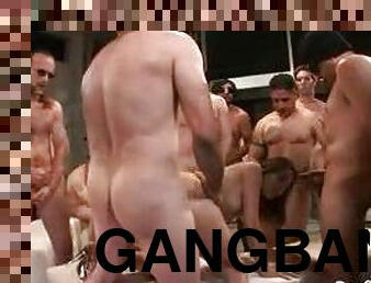 Gangbang hottie surrounded by dudes