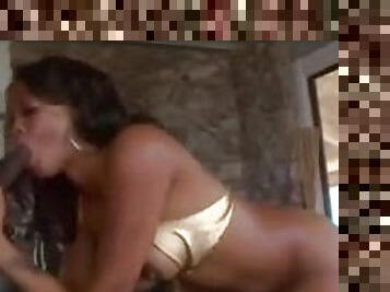 Gold bikini on a black babe that loves big cock