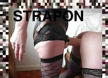 Sissy in stockings takes big strapon